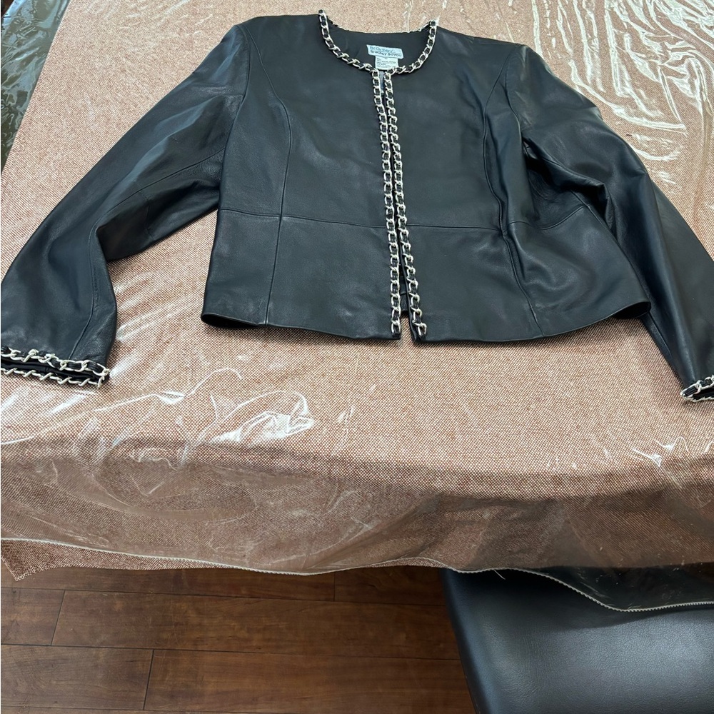 Elegant Black Leather Jacket with Chain Detail